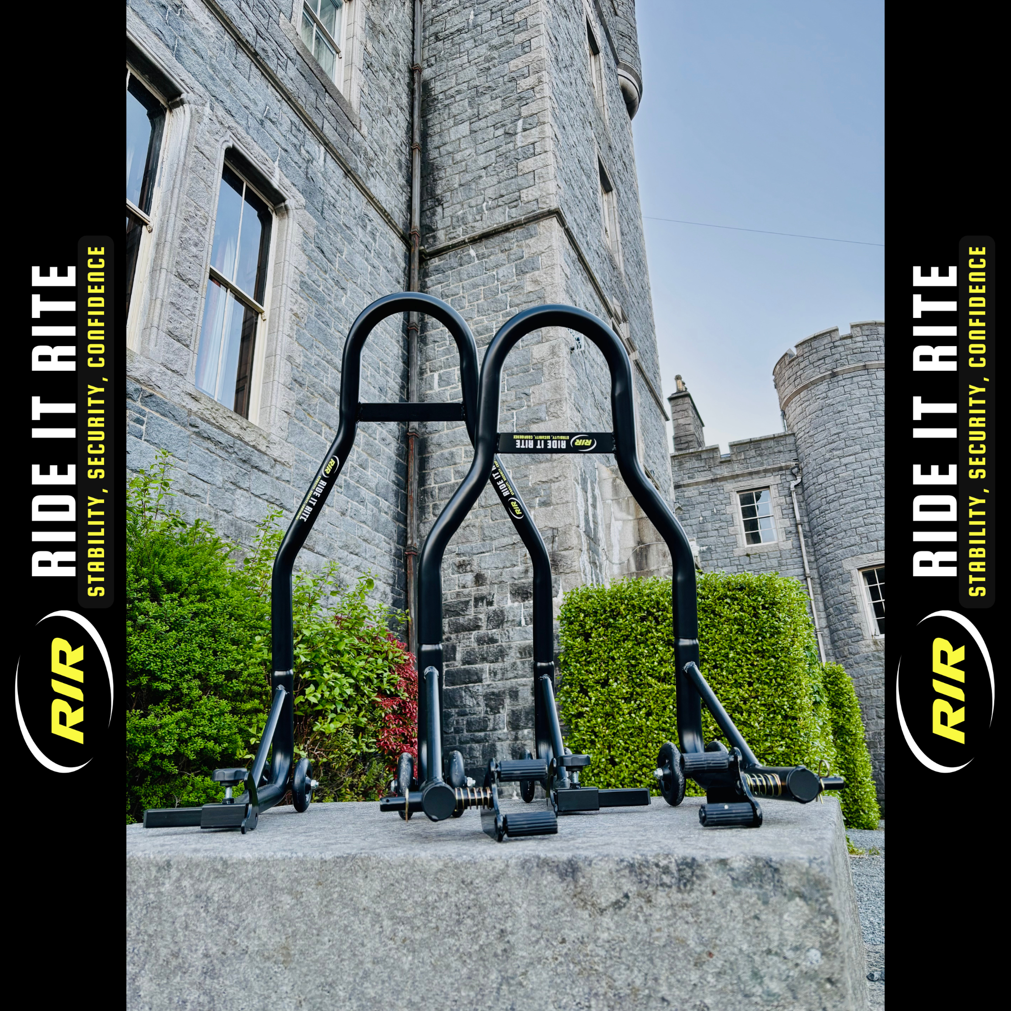 Set of black Ride It Rite paddock stands in front of a castle, Ride It Rite logos at the side.