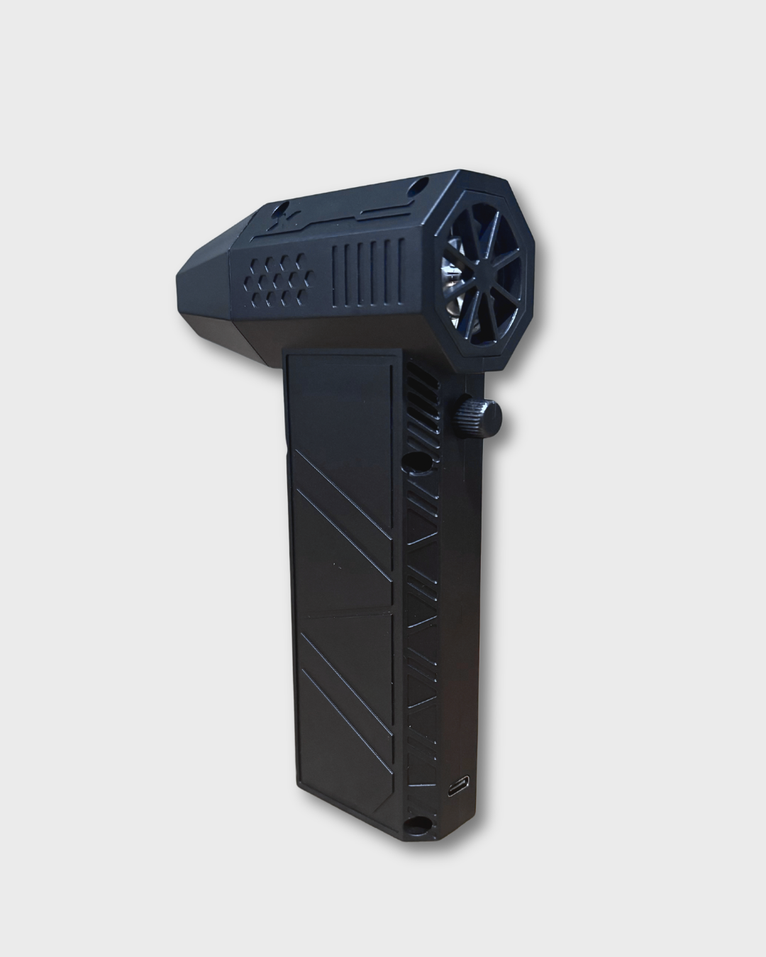 A black handheld motor cycle air blower with a hexagonal fan-like head and angular body, shown on a plain light gray background.